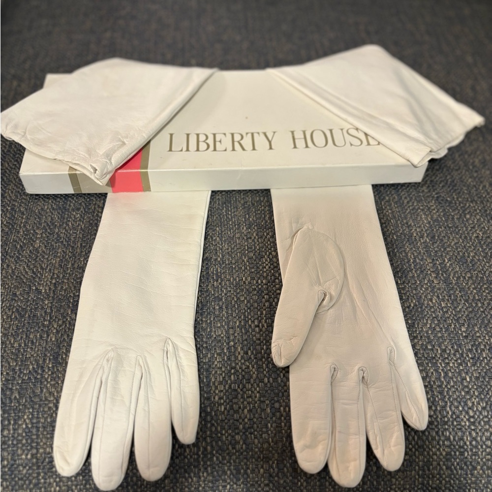 White leather with silk lining above the elbow gloves